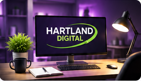 Hartland Digital desk and monitor artwork from approved contact page mockup